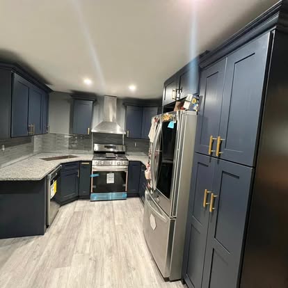 Custom kitchen cabinetry installation by A Kingdom Construction Co.