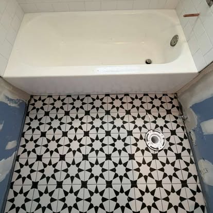 Bathroom renovation with double vanity by A Kingdom Construction Co.