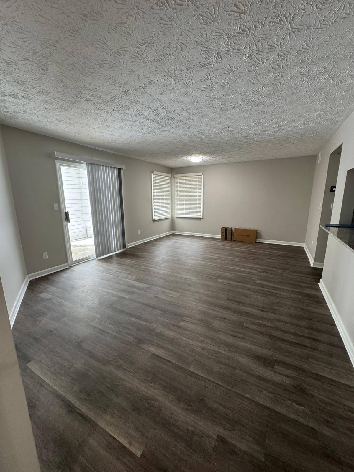 Hardwood floor refinishing by A Kingdom Construction Co.