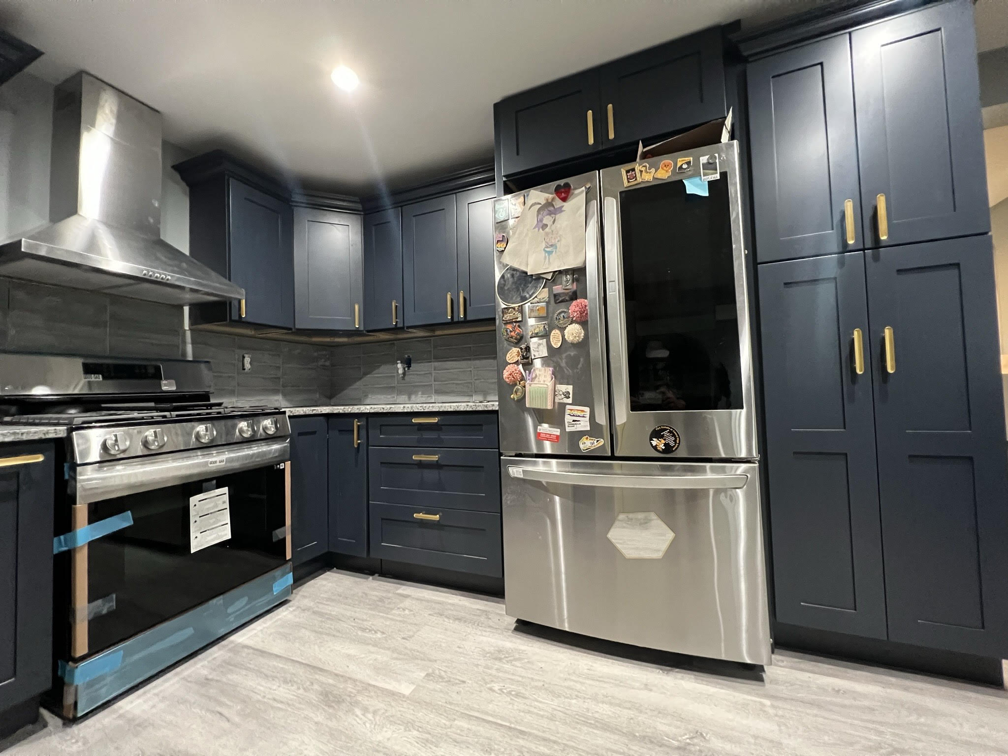 Kitchen remodel with cabinetry and countertops by A Kingdom Construction Co.