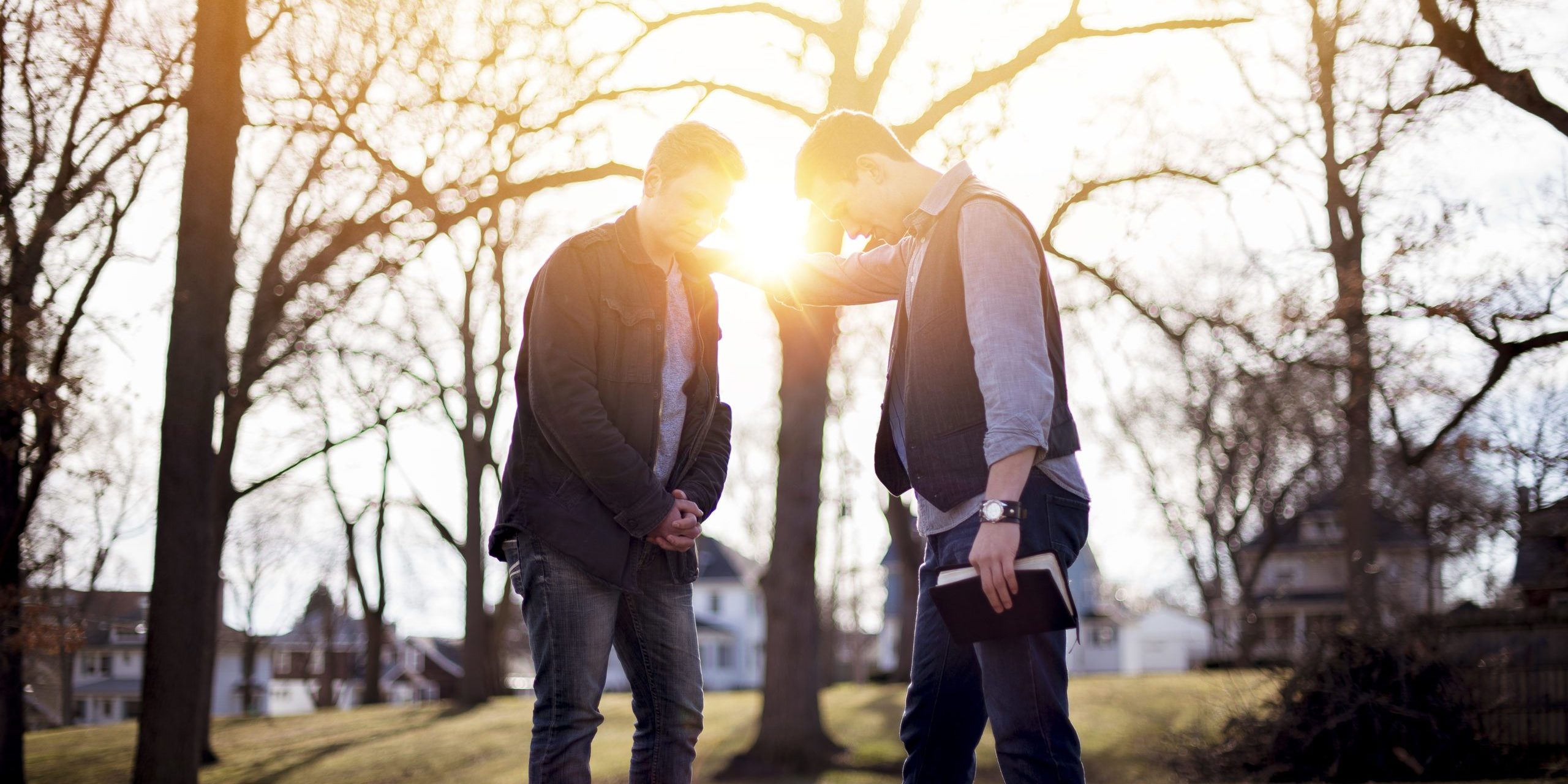 Men praying together