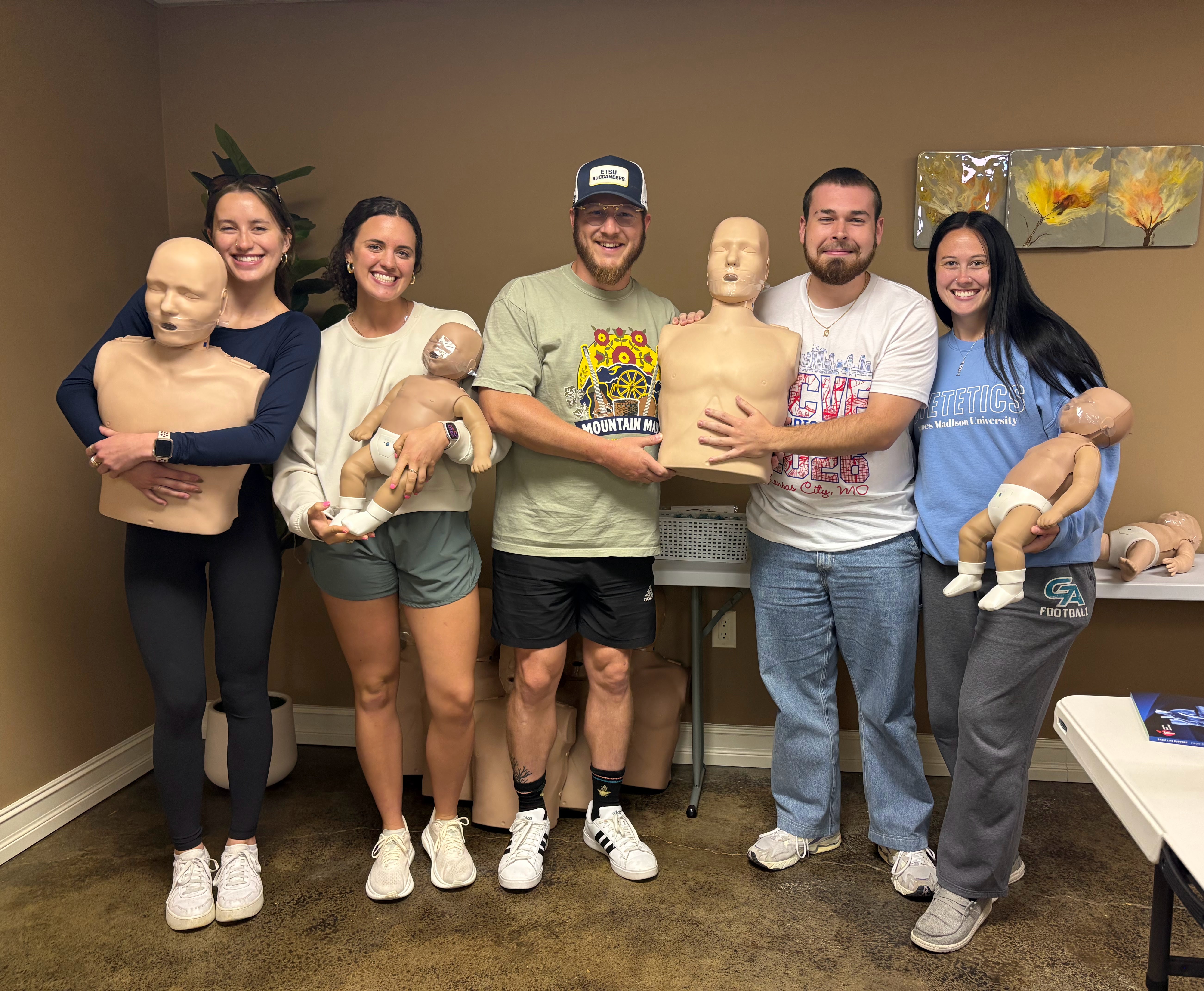 Group of students with mannequins