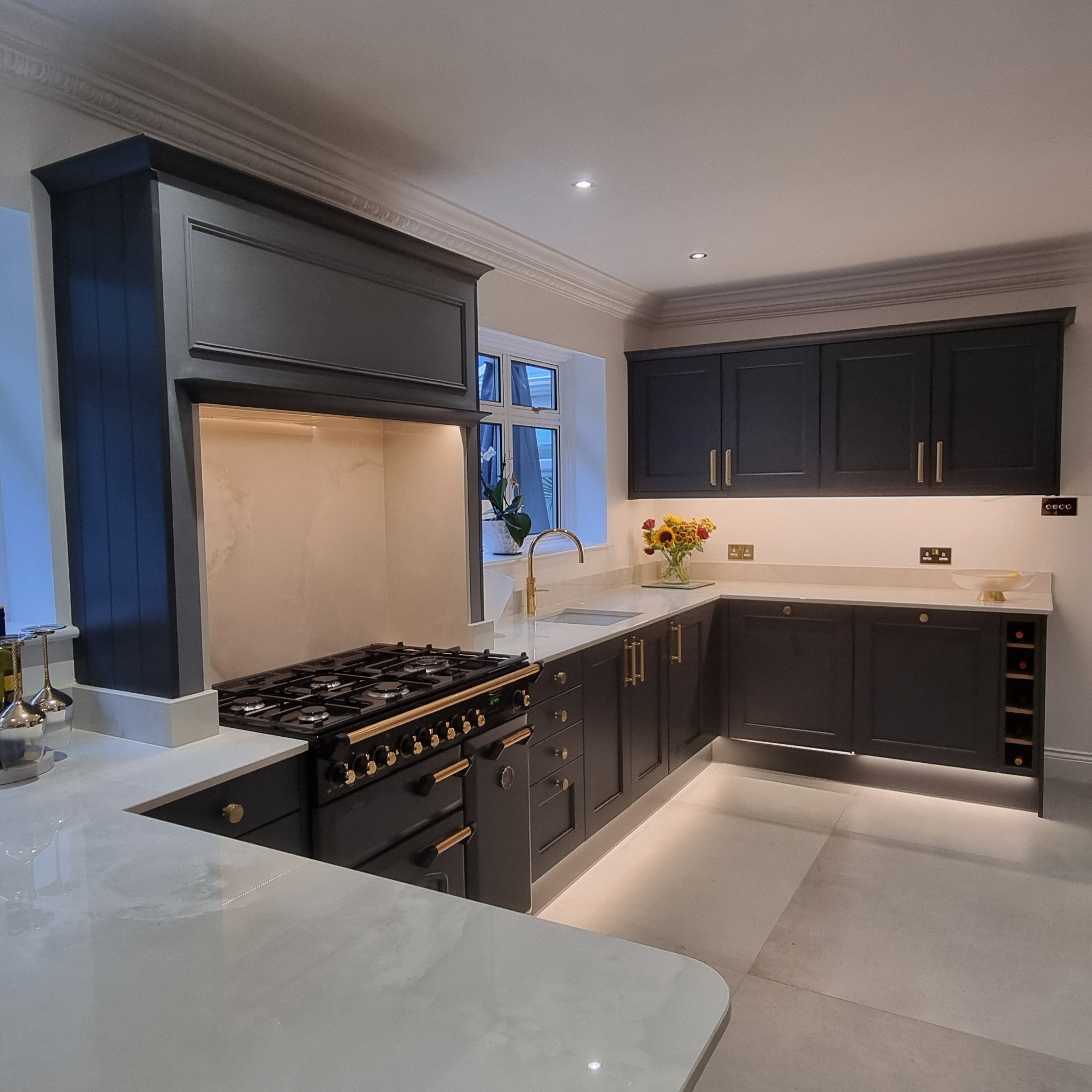 Modern kitchen renovation in Surrey featuring premium worktops and bespoke cabinetry