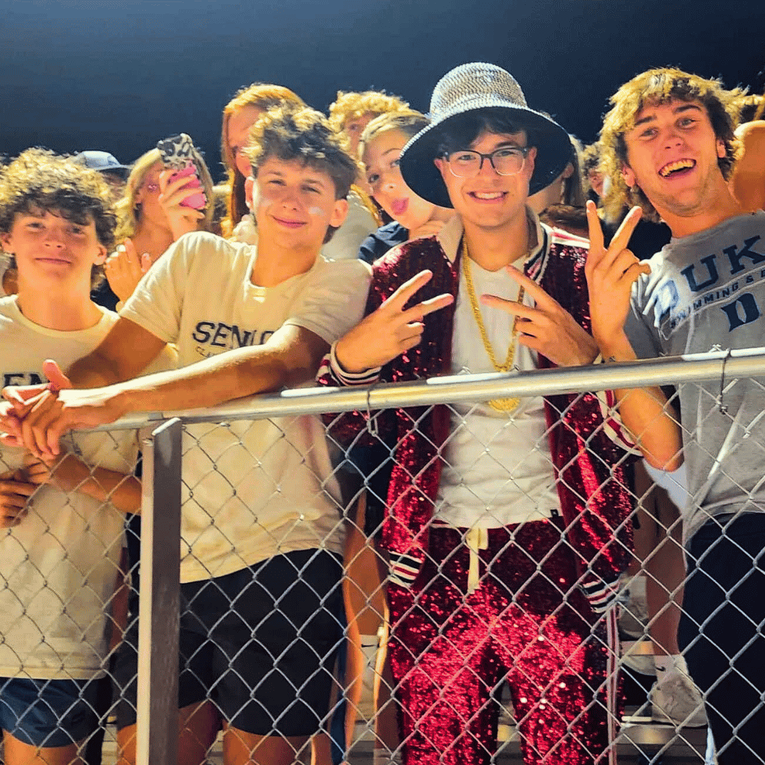 Cash in sequin outfit with friends