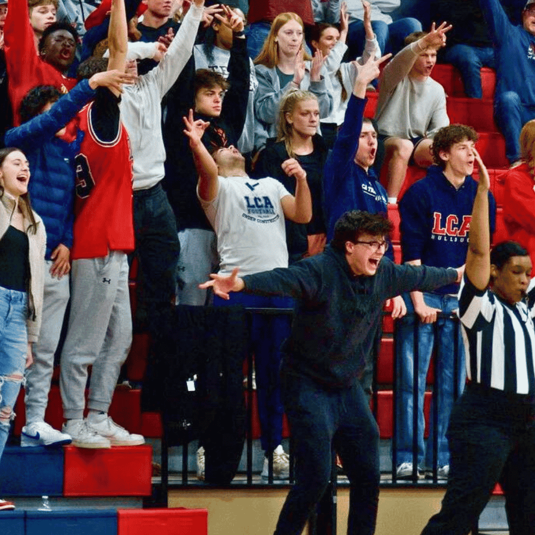 Cash cheering at basketball game
