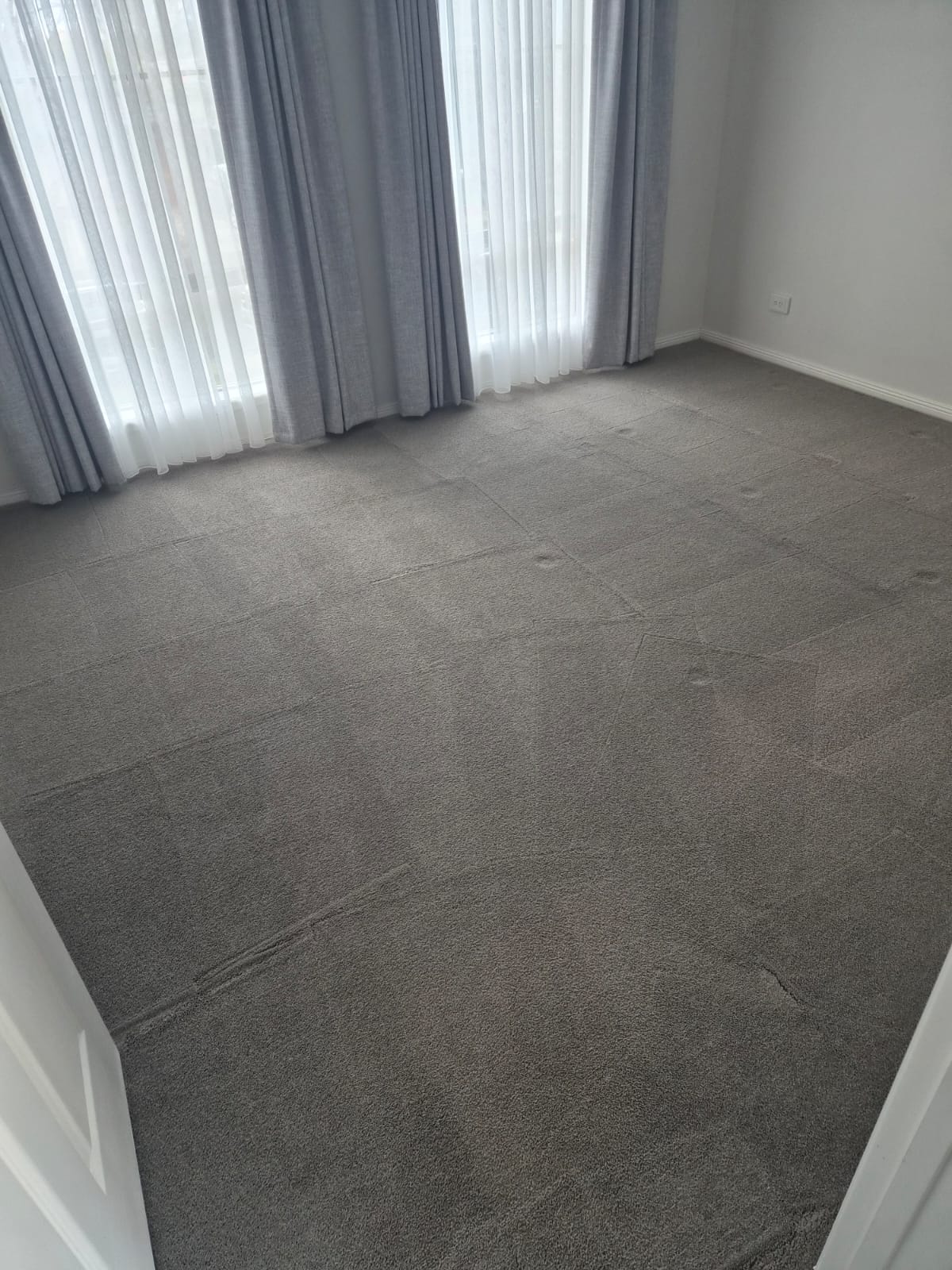 Cleaned living room carpet with pattern