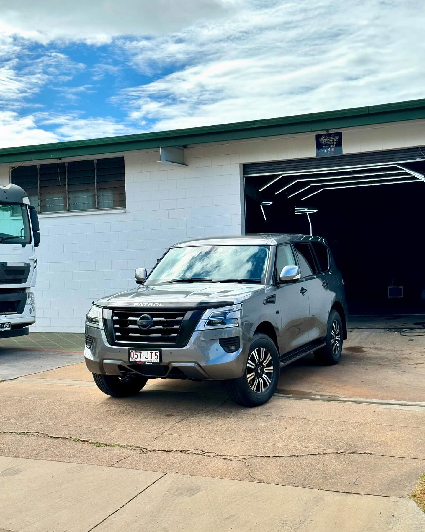Grey Nissan Patrol SUV parked outside the Master Wraps studio in Townsville