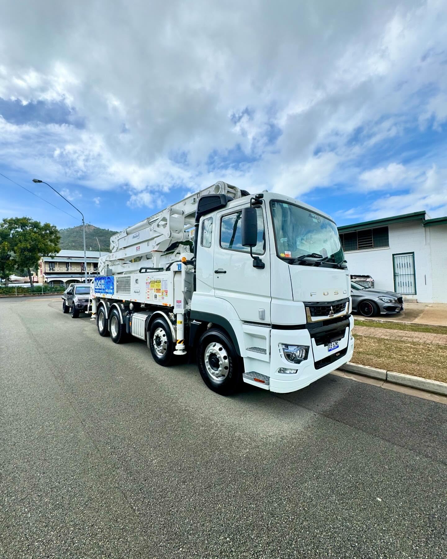 Line King Concrete Pumping truck front quarter view wrapped by Master Wraps