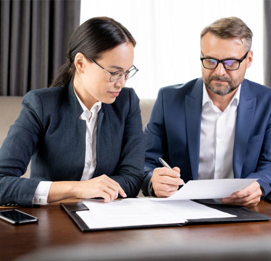 Professional private investigators reviewing case details in Durham County, NC