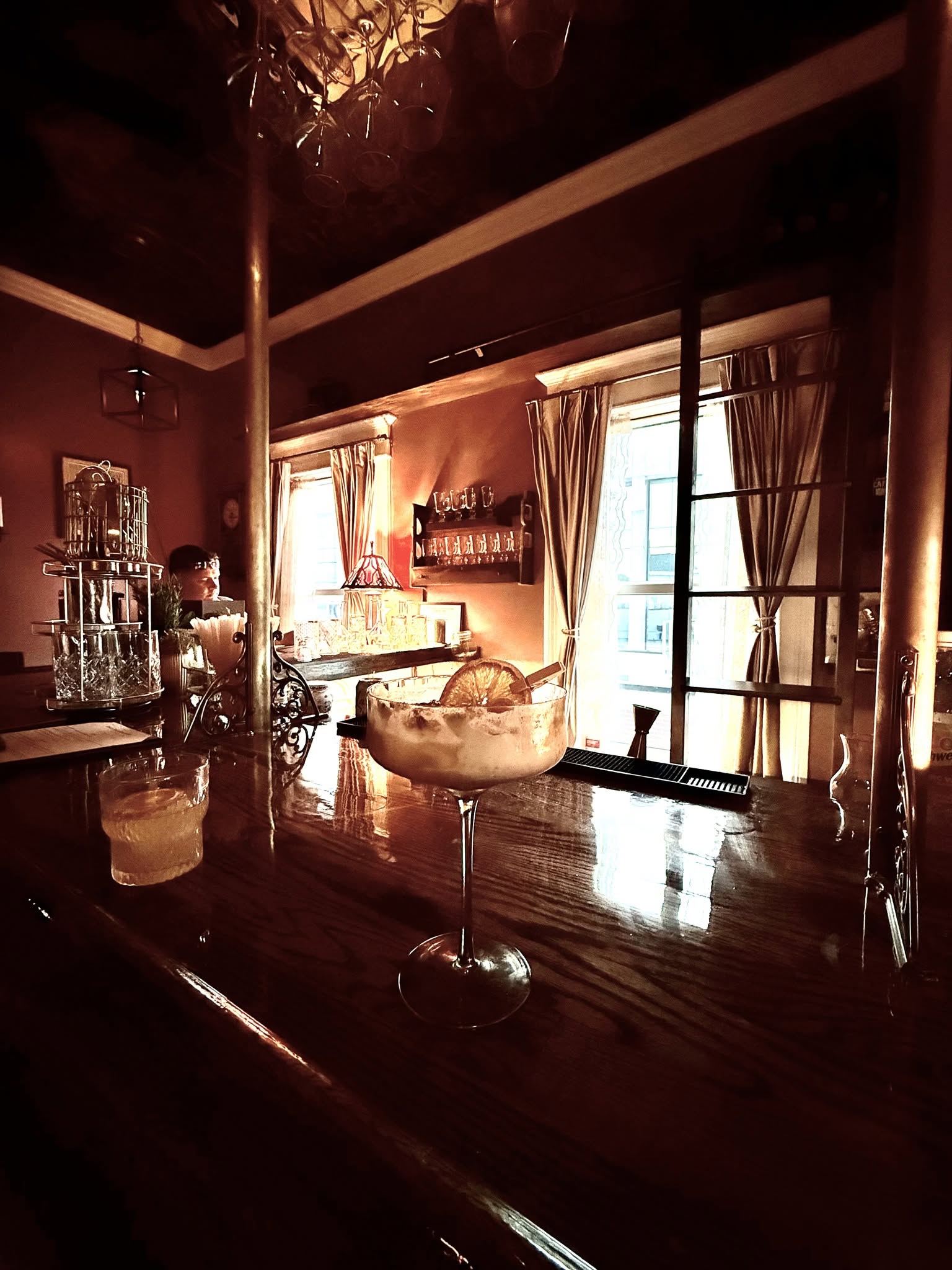The Boston House speakeasy bar with signature cocktail