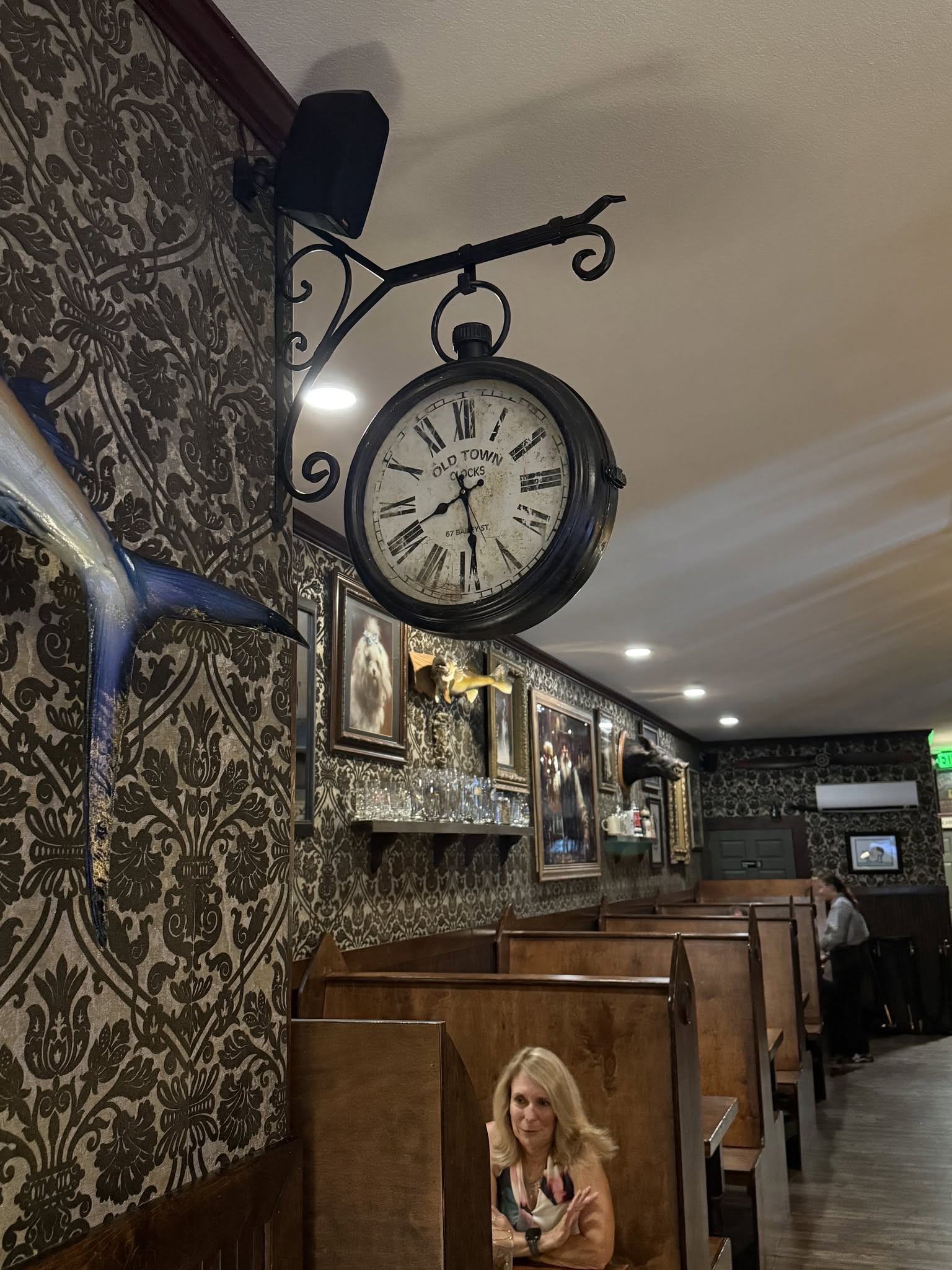 Poor Parson's Pub interior with cozy booths and vintage decor