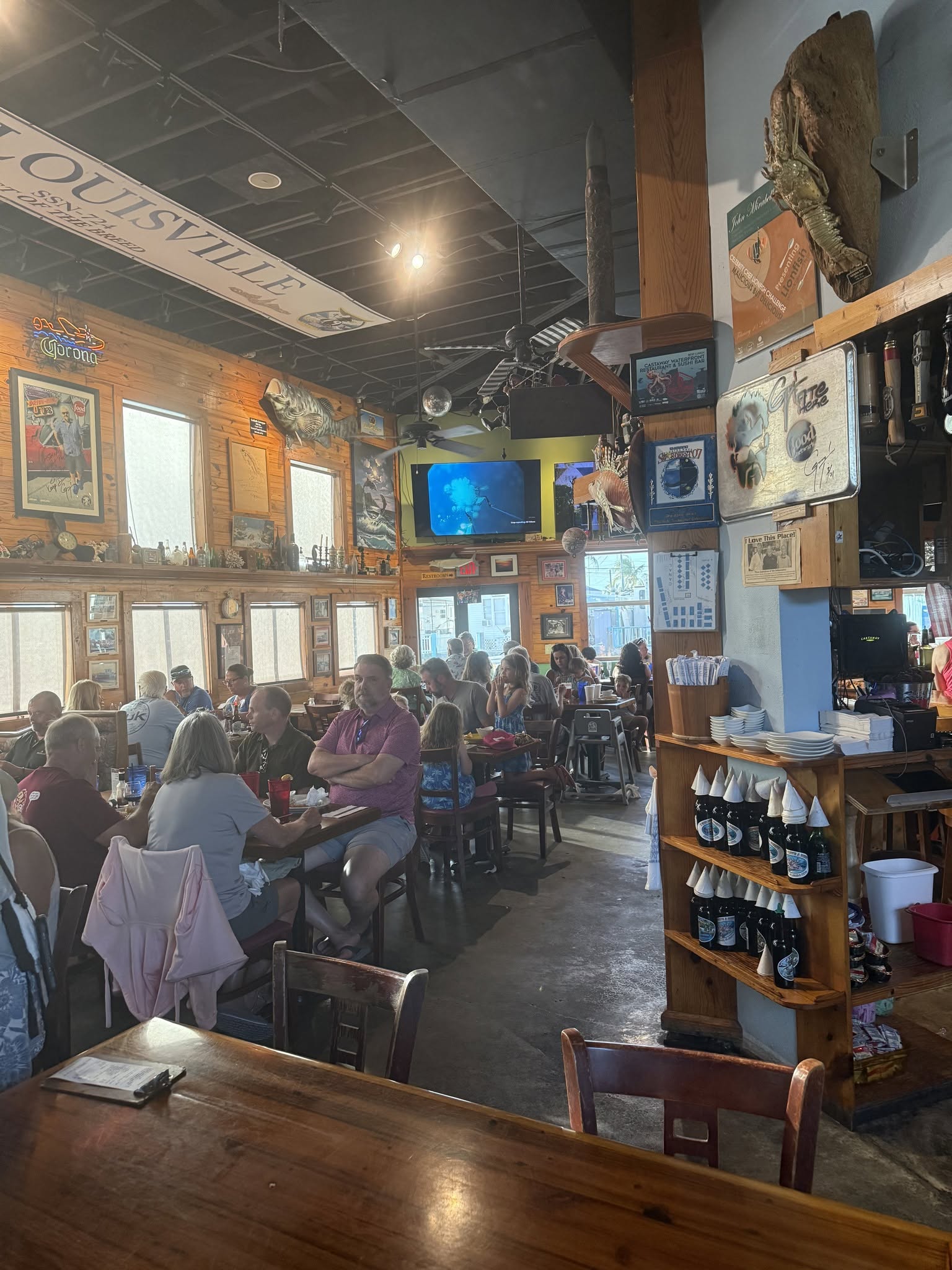 Castaway dining room filled with patrons and nautical decor