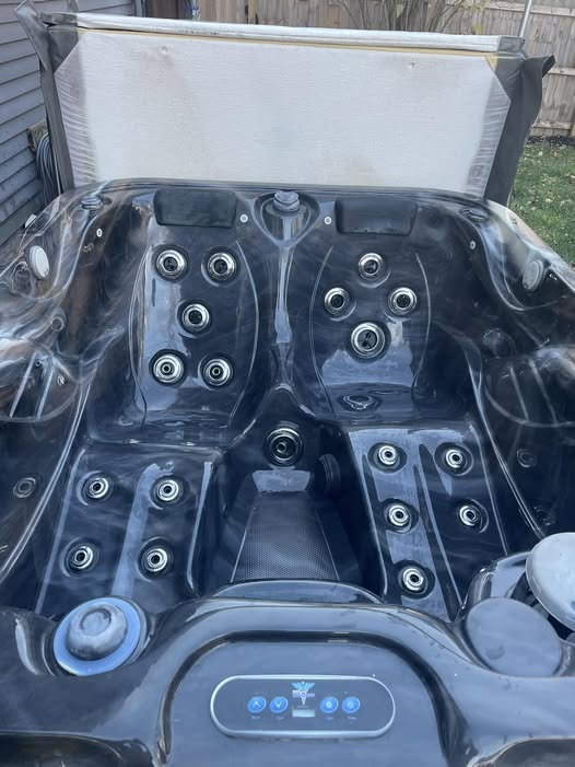 Empty hot tub ready for repair