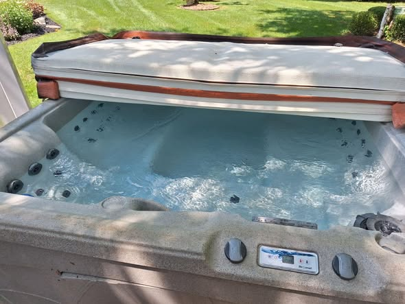 Outdoor hot tub filled with clean water