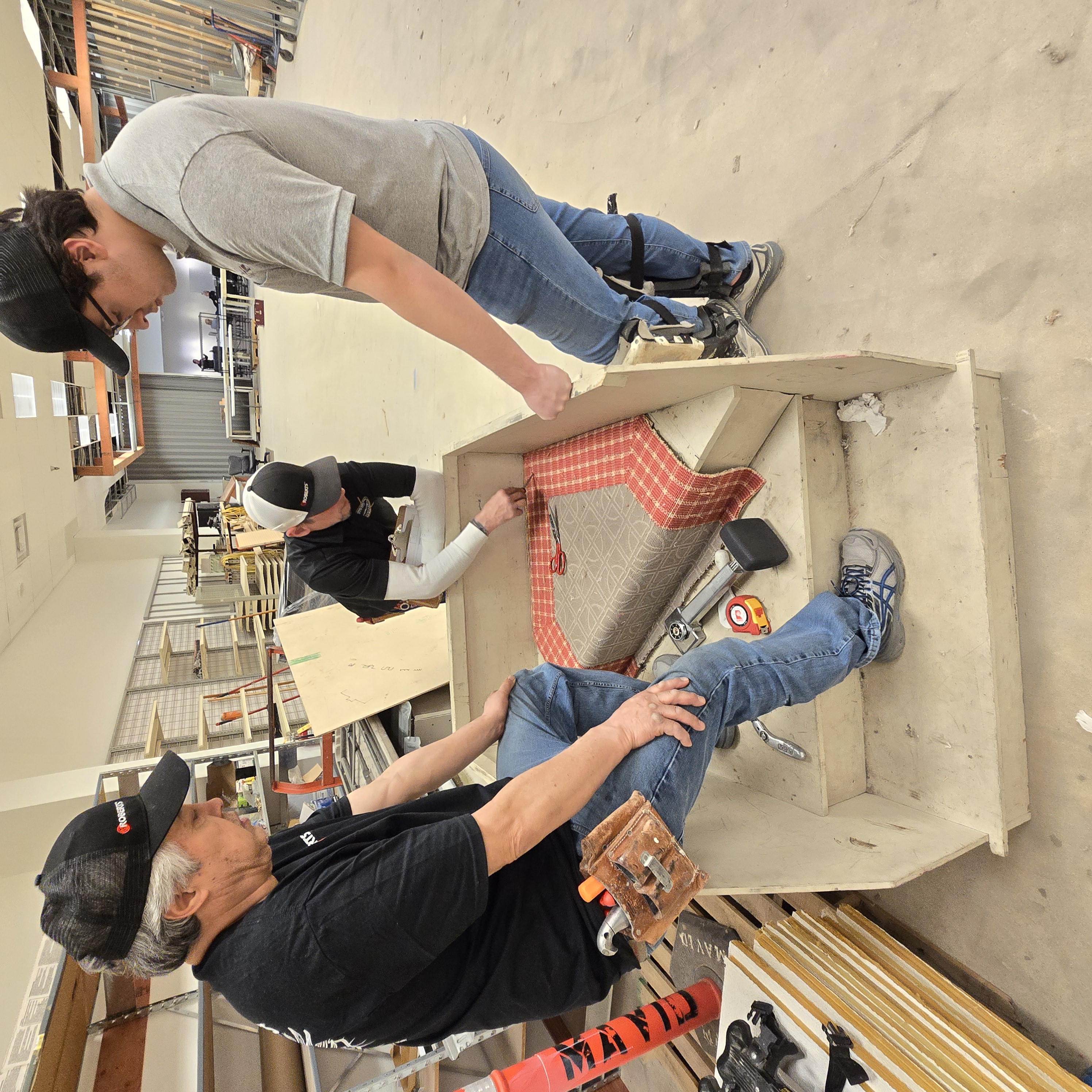 LaValle Flooring team working on a carpet project