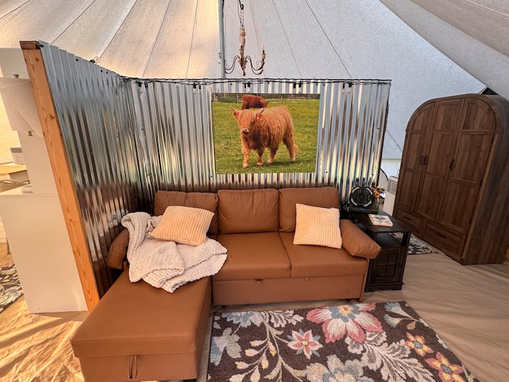 Cozy living room area inside Dolly's Dream Den tent