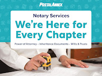 PostalAnnex Murfreesboro notary public professionally notarizing legal documents at the counter