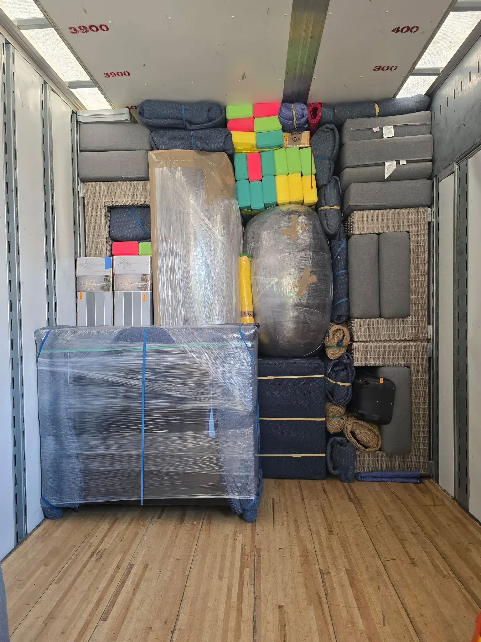 Perfectly packed moving truck showing professional wrapping