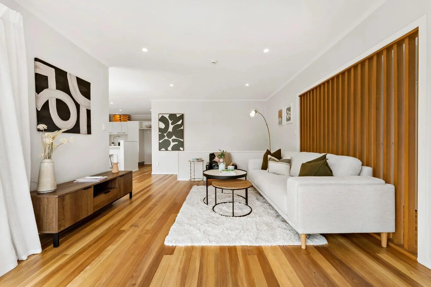Clean living room with wood floors