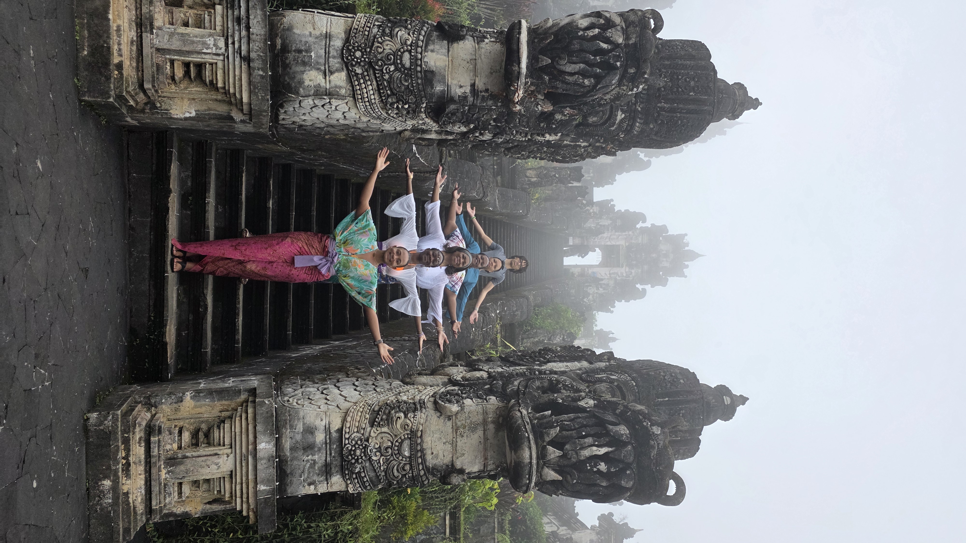Women on temple stairs in Bali