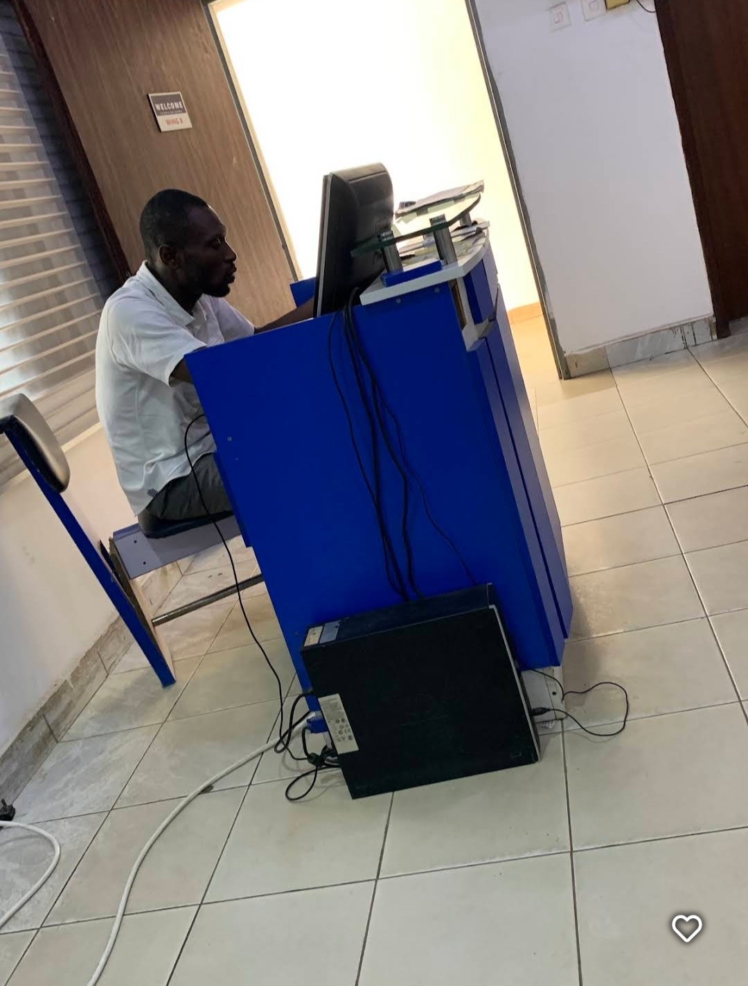 Crescent Radiology team member at diagnostic workstation in Wuse, Abuja facility