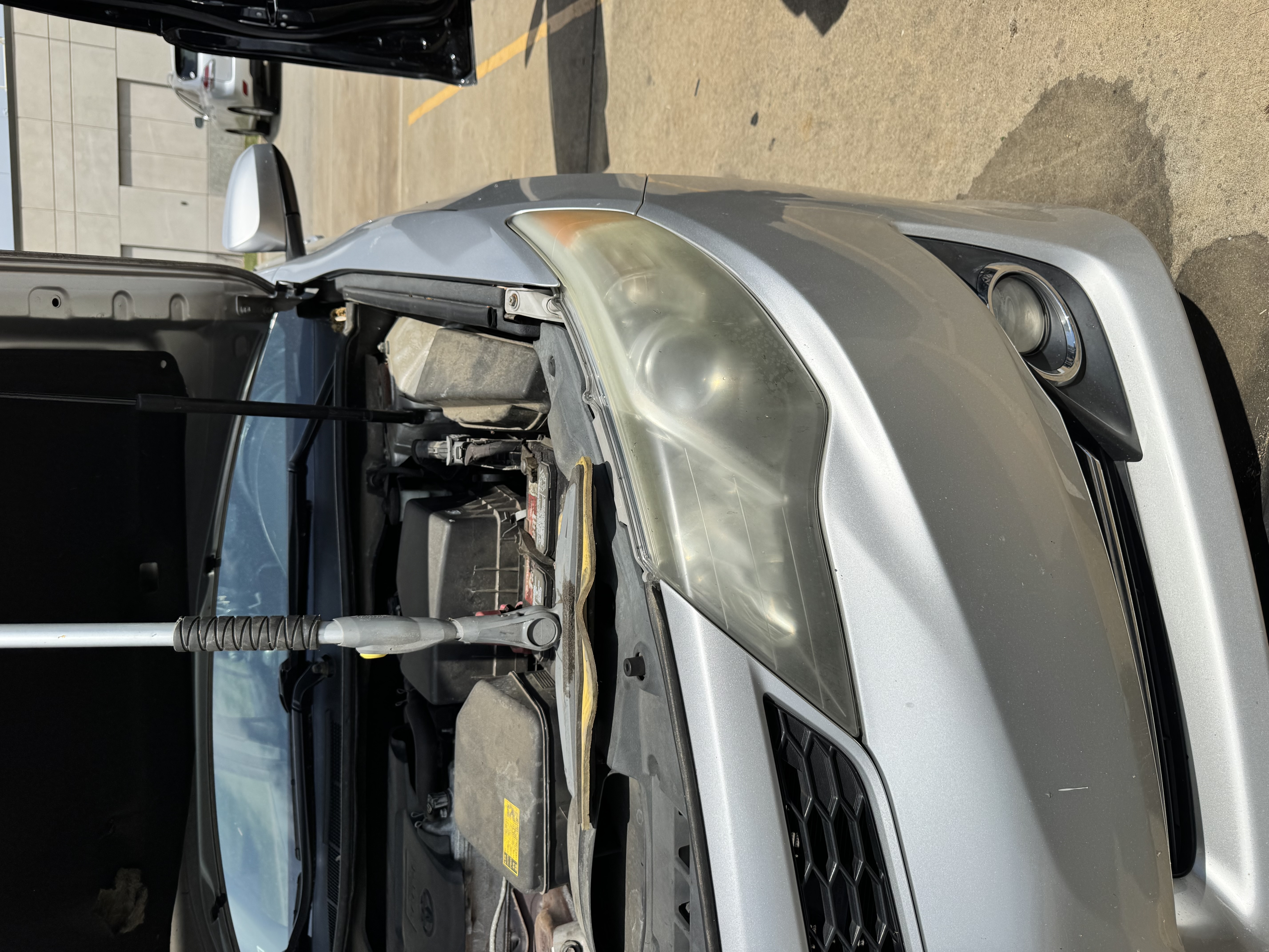 Illustrative example — cloudy headlight before restoration in Frederick MD