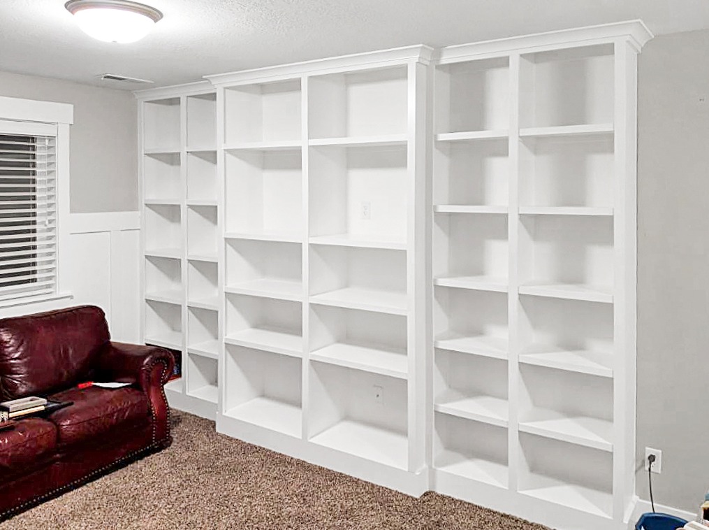 Custom white built-in shelving unit installed in Utah County home