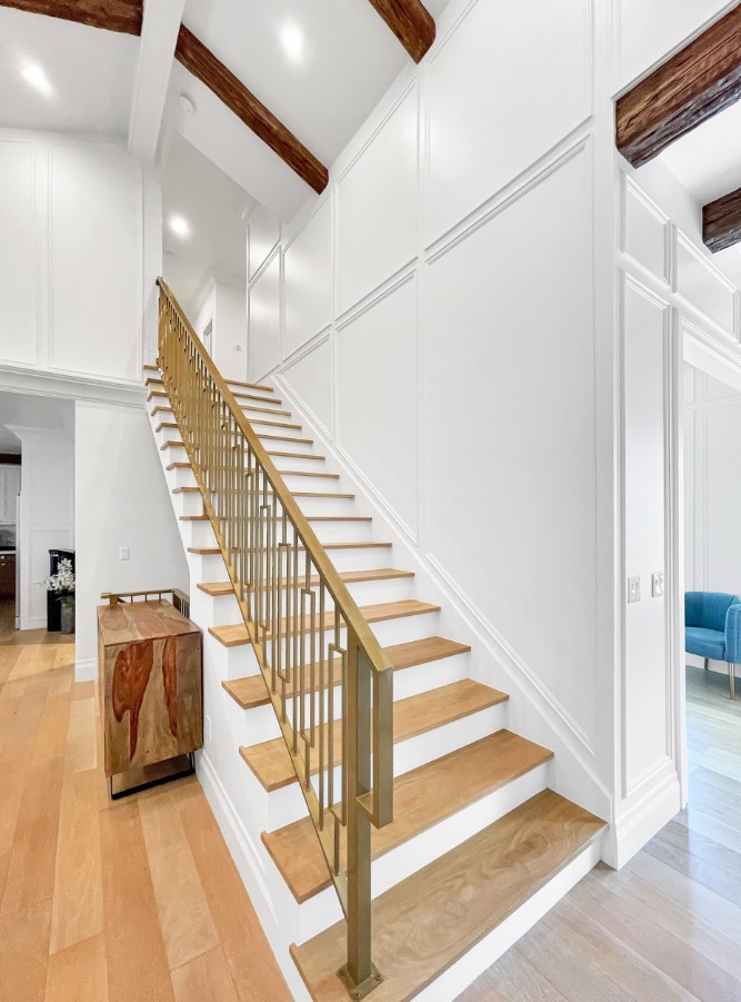 Custom staircase railing and trim installation completed by Sharp Blade Trim Works in Springville, UT