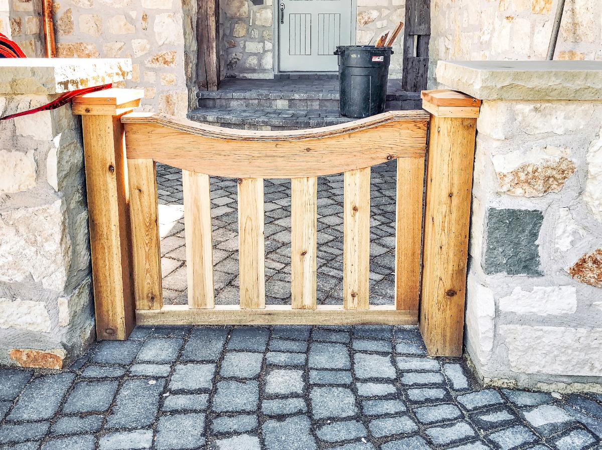 Custom outdoor wooden gate installation