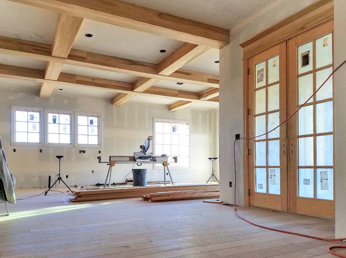 Exposed wood beam ceiling installation
