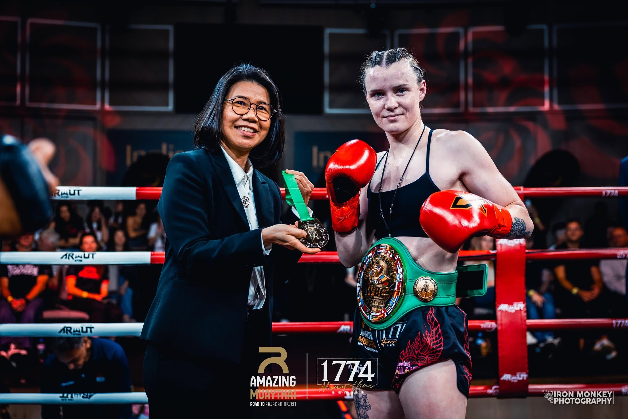 Jasmine Riggs celebrates capturing the WBC State Mini-Flyweight Title