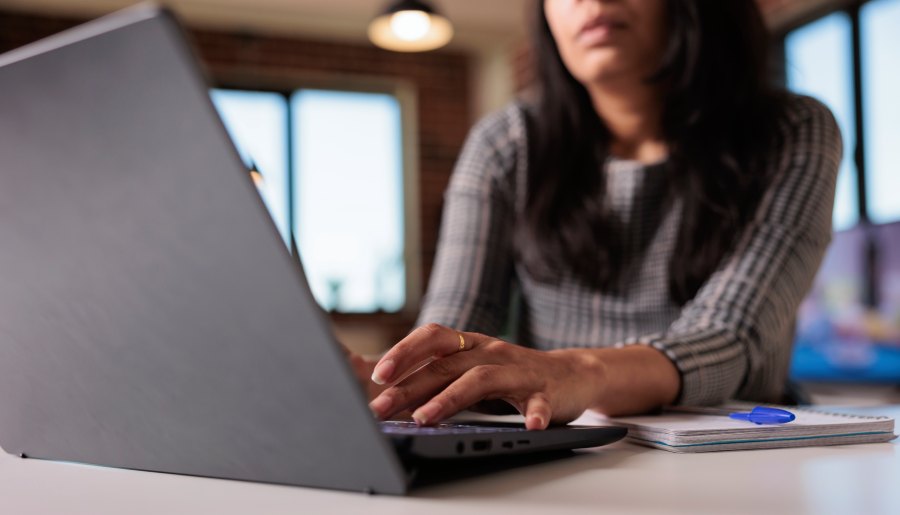 Family reviewing immigration bond information on laptop