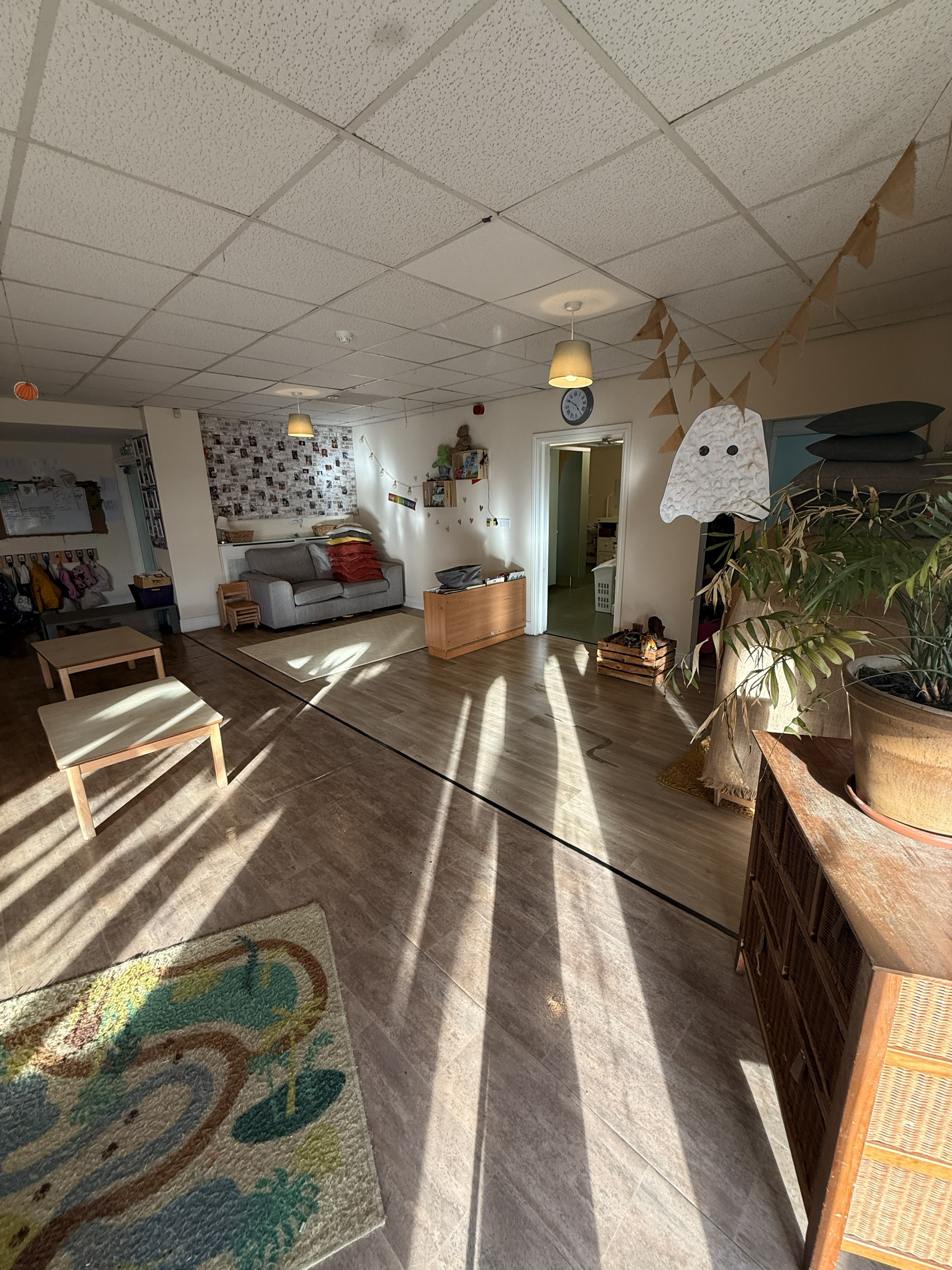 Bright community centre with wooden floors and children's play area - Crystal Clean commercial cleaning