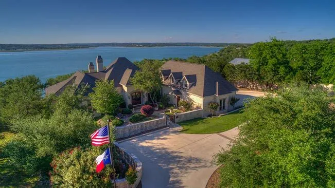 Luxurious lakefront property in Canyon Lake featuring extensive grounds and stunning water views