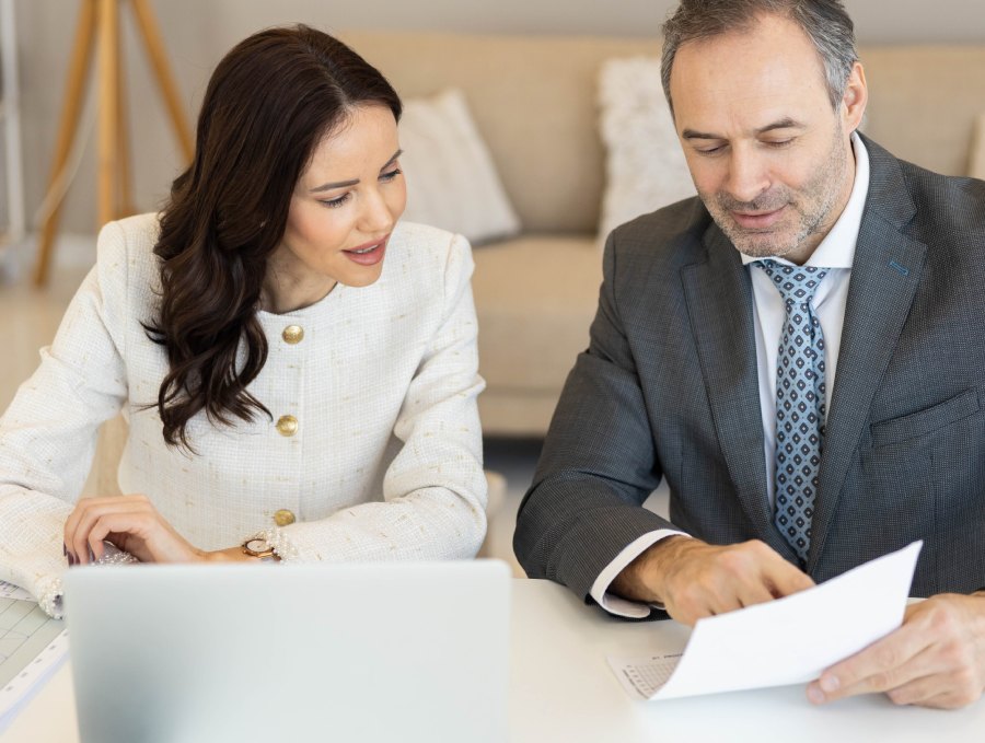 Bail bond agent explaining paperwork to a client