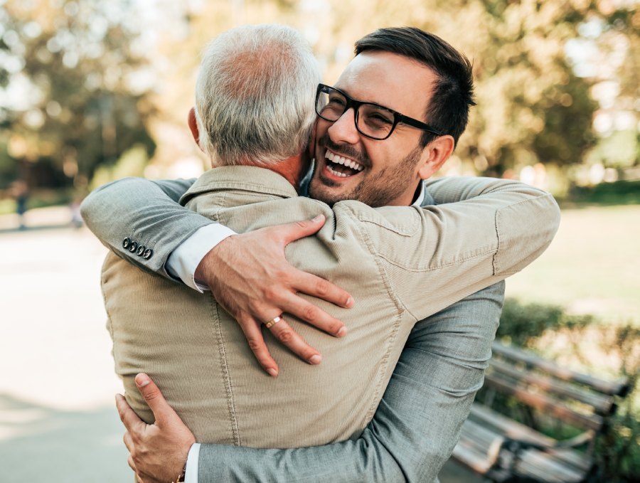 Happy family hugging after release
