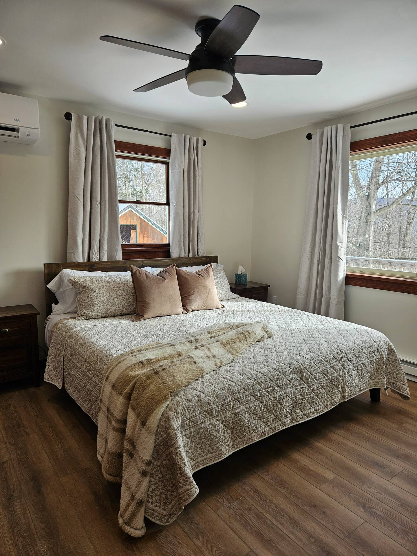 Bedroom 1 — master suite with king bed at The Overlook ADK