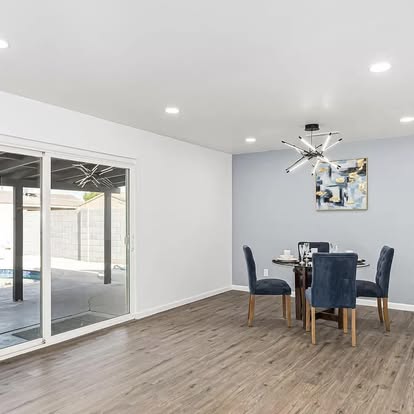 Modern Dining Space with Wood-Look Flooring - Flooring Installation by Builders For You Construction in Yuma, AZ