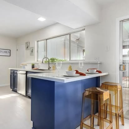 Marble Backsplash and Modern Range Hood - Kitchen Remodeling by Builders For You Construction in Yuma, AZ