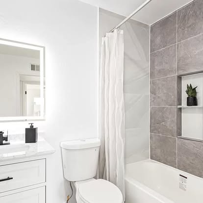 Contemporary Gray Tile Tub Combo Contemporary Gray Tile Tub Combo - Bathroom Remodeling by Builders For You Construction in Yuma, AZ