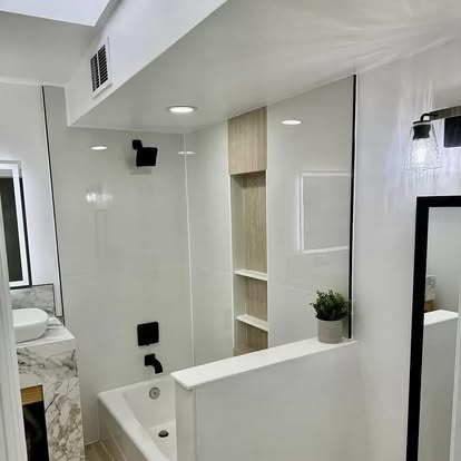 Sleek White Tub and Shower Sleek White Tub and Shower - Bathroom Remodeling by Builders For You Construction in Yuma, AZ