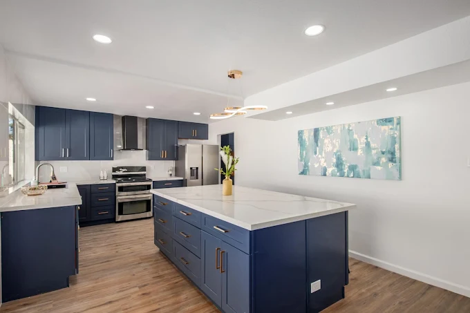 Kitchen remodel by Builders For You Construction with navy blue cabinets and quartz island in Yuma, AZ