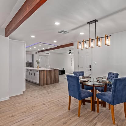 Dining Area with Blue Velvet Chairs - Dining & Kitchen Remodeling by Builders For You Construction in Yuma, AZ
