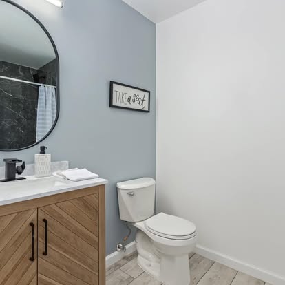 Wood Chevron Vanity & Dark Shower Wood Chevron Vanity & Dark Shower - Bathroom Remodeling by Builders For You Construction in Yuma, AZ