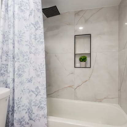 White Marble-Look Shower Tub Combo White Marble-Look Shower Tub Combo - Bathroom Remodeling by Builders For You Construction in Yuma, AZ