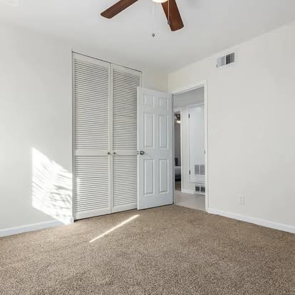 Bedroom with Plush Carpet Flooring - Flooring Installation by Builders For You Construction in Yuma, AZ