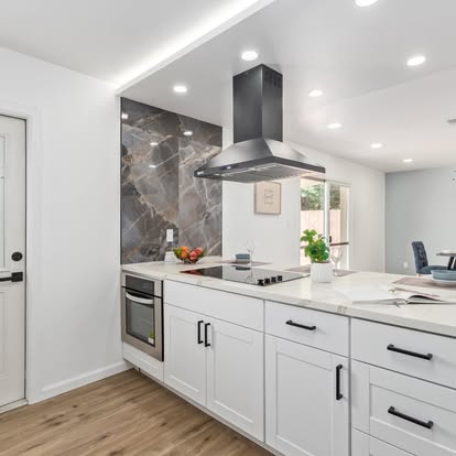 Kitchen Island with Amber Stools - Kitchen Remodeling by Builders For You Construction in Yuma, AZ
