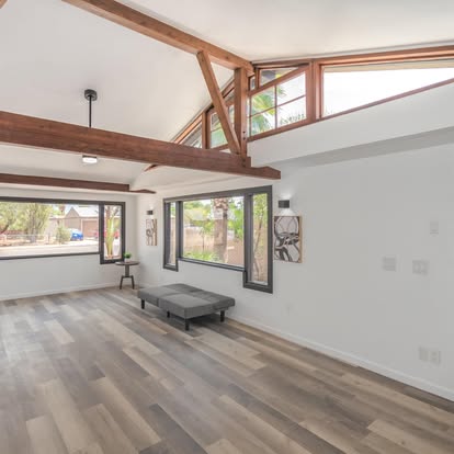 Living Room with Wood Beams and Flooring - Flooring Installation by Builders For You Construction in Yuma, AZ