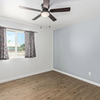Empty Room with Wood Flooring - Flooring Installation by Builders For You Construction in Yuma, AZ