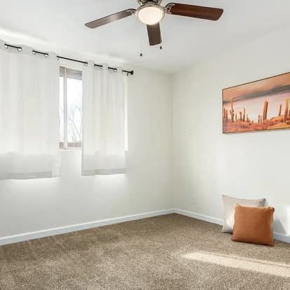 Bedroom with Textured Carpet - Flooring Installation by Builders For You Construction in Yuma, AZ